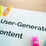 image-from-wall.io-saying-user-generated-content-on-a-notebad-scaled