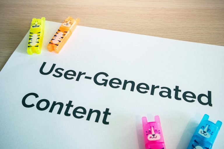 image-from-wall.io-saying-user-generated-content-on-a-notebad-scaled