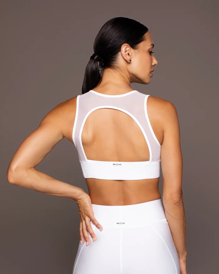 Backshot of a woman in a Michi white bra